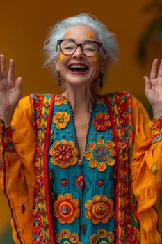 A happy and playful elderly woman in colored clothes.