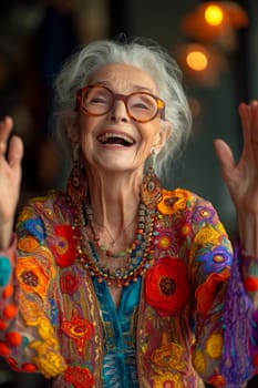 Happy and playful elderly woman in colored clothes indoors.