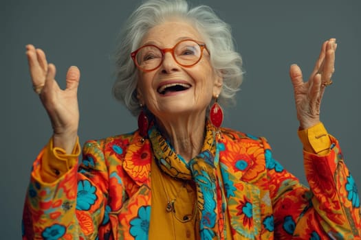 A happy and playful elderly woman in colored clothes.