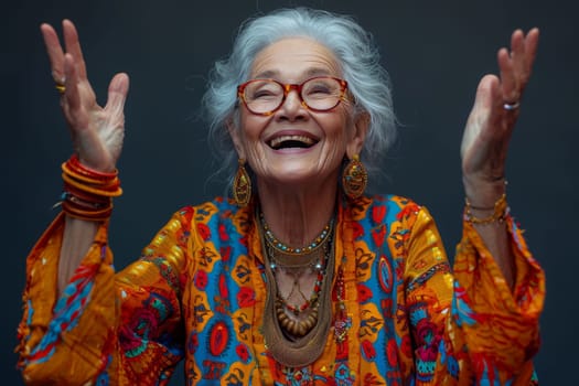 A happy and playful elderly woman in colored clothes.