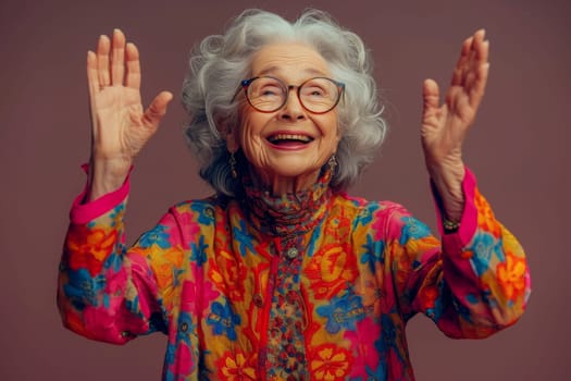 A happy and playful elderly woman in colored clothes.