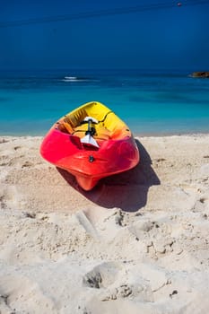 Active rest, sport, kayak. Canoe on a sandy beach