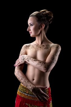 Mehndi. Nice topless brunette with floral pattern on her hands