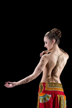 Mehndi. On woman's body beautiful patterns of henna