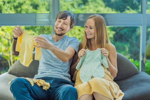 In a heartwarming scene, the future mom and dad hold their unborn baby's clothes in their hands, savoring the joy of anticipation and shared excitement for their little one's arrival.