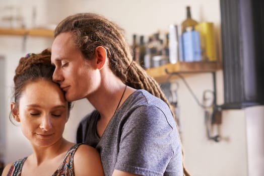 Hug, rasta and home with couple, peace and bonding together with happiness and calm. Marriage, apartment and embrace with romance and dreadlocks with relationship and morning with man, love and woman.