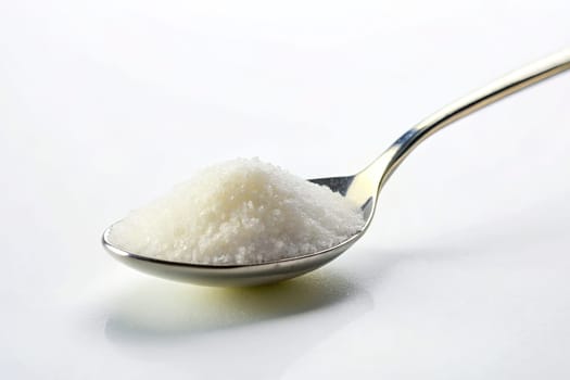 Sugar in a spoon on background, close-up. isolated. Food concept.