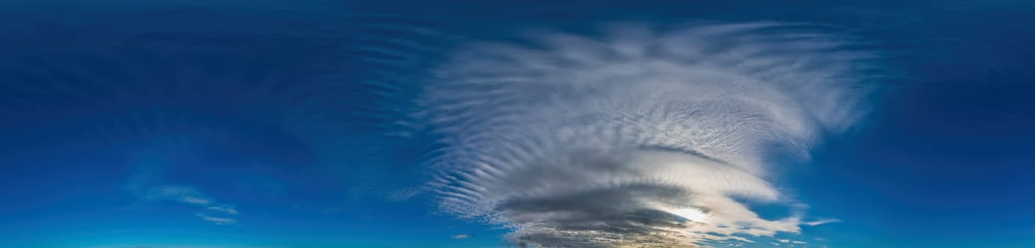 Blue sky with Cirrus clouds Seamless panorama in spherical equirectangular format. Complete zenith for use in 3D graphics, game and for composites in aerial drone 360 degree panoramas as a sky dome.