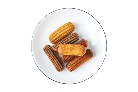 Churros with curry, olives and tomato paste on white background