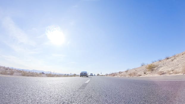 HWY 15, California, USA-December 3, 2022-Embarking on a road trip from Nevada to California, driving on Highway 15 during the day offers scenic views and an exciting journey between states.