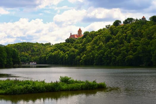 Beautiful Gothic castle Veveri. The city of Brno at the Brno dam. South Moravia - Czech Republic - Central Europe. Spring landscape.