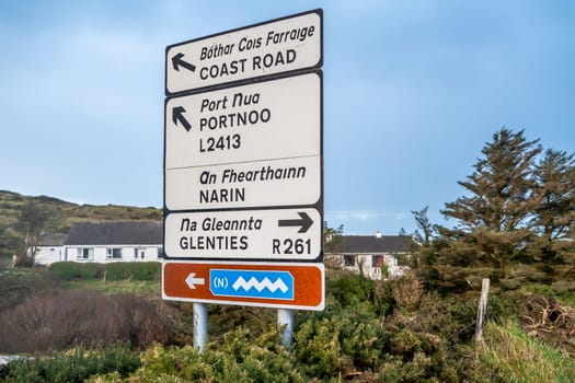 PORTNOO, COUNTY DONEGAL / IRELAND - DECEMBER 24 2019 : Sign showing the way to Portnoo and Glenties