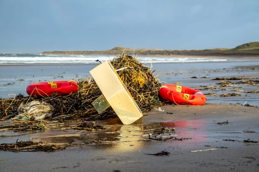 NARIN, PORTNOO, IRELAND - JANUARY 15 2020 : Ringbuoy lying on Portnoo beach in County Donegal after storm Brendan.