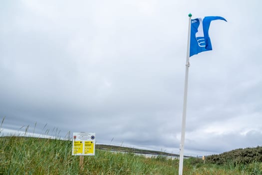 PORTNOO, COUNTY DONEGAL / IRELAND - JUNE 17 2020: Sign explaining the 2m social distancing rule at the beach.