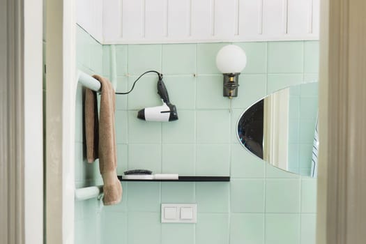 Budget bathroom interior in bright colors. Details of the bathroom interior