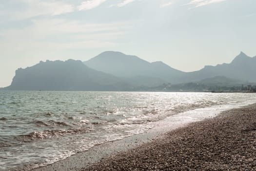 Beach Relaxation at the Black Sea. Fairy-tale Moments of a Sunny Day. The concept of tourism and sea travel.