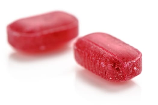 red fruit hard candy isolated on white. lollipop, candy, sweetmeat 1