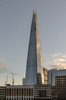 London, UK - Feb 27, 2024 - Modern architecture view of The Shard skyscraper and Different buildings. The tallest building with sky background. Space for text, Selective focus.