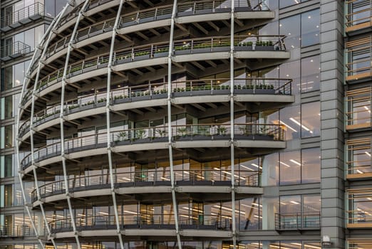 London, UK - Feb 27, 2024 - Modern architectural design of Riverside House. Exterior detail of Curved building along the River Thames of the City of London. Space for text, Selective focus.