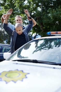 Police officer, handcuffs and car to arrest person for crime with safety, protection and security. People, law enforcement and government service with justice, peace and vehicle for danger in society.