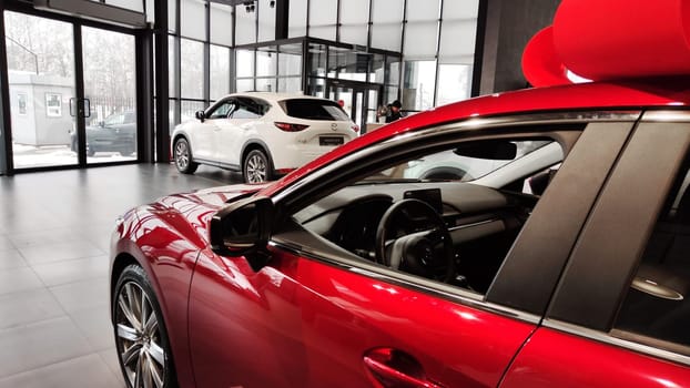 Cheboksary, Russia - March 20, 2023: Cars in showroom of dealership Mazda