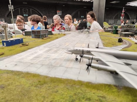 Saint-Petersburg, Russia - August 03, 2023: grand project Russia. Layout of city, country, street, landscape with small toy people, houses, roads, cars, nature and visitors tourists in the museum