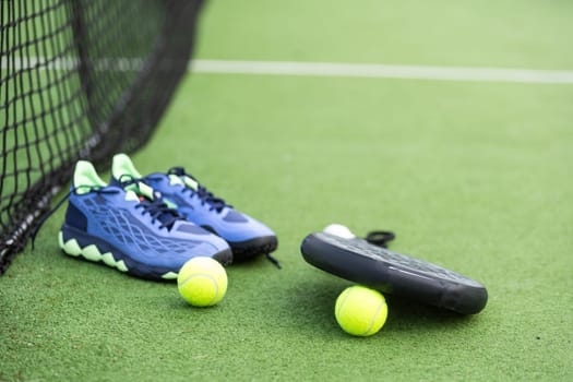 Paddle tennis objects and court. High quality photo