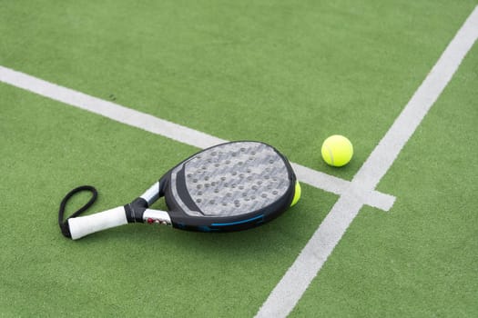 Paddle tennis racket and ball. High quality photo