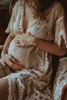 pregnant woman sitting on the sofa. Selective focus. people.