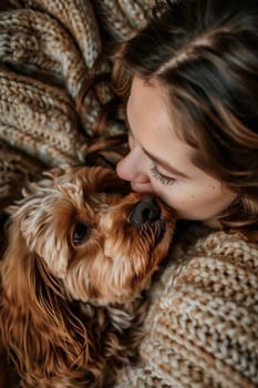 the owner kisses the dog. Selective focus. people.