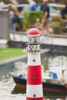 Toy lighthouse in a miniature city in the Netherlands.