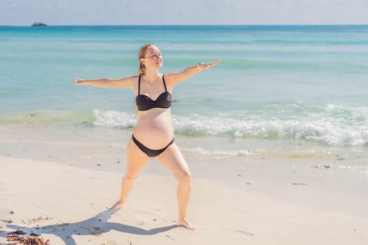 Harmonizing mind and body, a pregnant woman gracefully practices yoga on the beach, embracing the serenity of the seaside for a tranquil and mindful pregnancy experience.