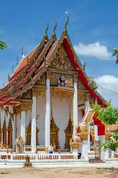 Phuket, Thailand - February 27, 2024: Detailed view of the pagoda at Phuket's largest Buddhist Temple Wat Chalong.