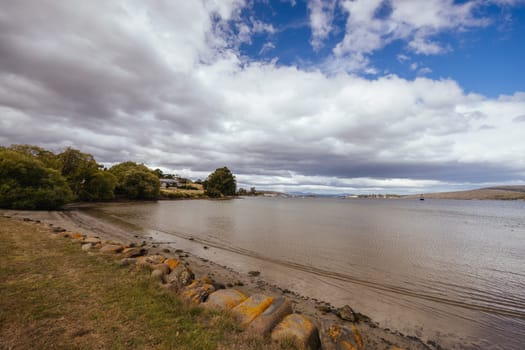 DOVER AUSTRALIA - FEBRUARY 25, 2024: Views of the quaint town of Dover and the Port of Esperance waterfront on the Southern Peninsula in Huon Valley, Tasmania, Australia