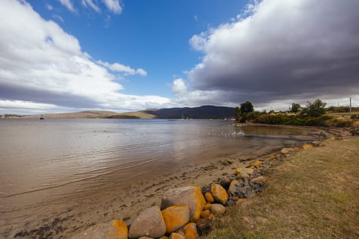 DOVER AUSTRALIA - FEBRUARY 25, 2024: Views of the quaint town of Dover and the Port of Esperance waterfront on the Southern Peninsula in Huon Valley, Tasmania, Australia