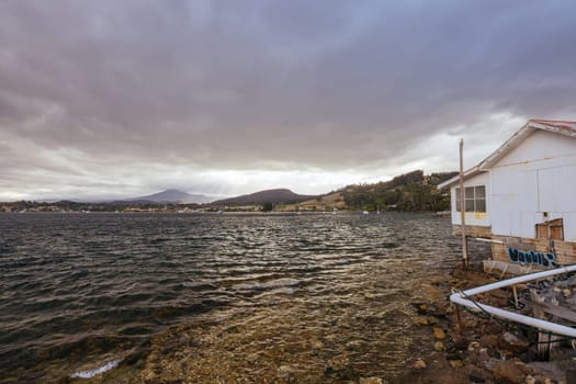 DOVER AUSTRALIA - FEBRUARY 25, 2024: Views of the quaint town of Dover and the Port of Esperance waterfront on the Southern Peninsula in Huon Valley, Tasmania, Australia