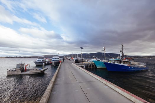 DOVER AUSTRALIA - FEBRUARY 25, 2024: Views of the quaint town of Dover and the Port of Esperance waterfront on the Southern Peninsula in Huon Valley, Tasmania, Australia