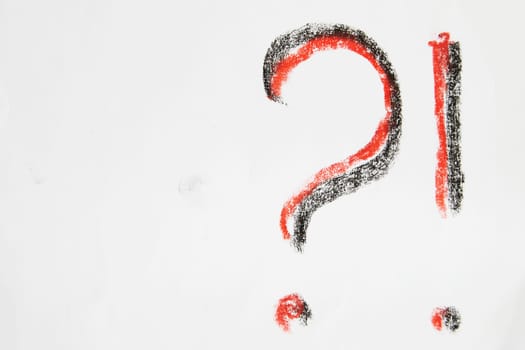 Hand-drawn question and exclamation marks, boldly marked in black on white sheet of paper, concept of questioning, uncertainty, searching for information