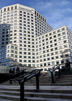 London, United Kingdom - February 03, 2019: Modern offices of UK branch of Credit Suisse at Canary Wharf. CS Group AG is multinational investment bank founded in 1856