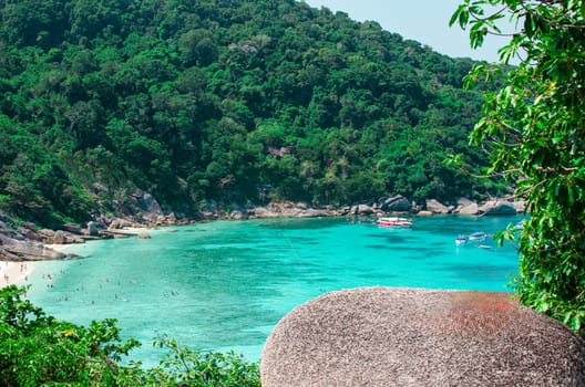 Tropical islands of ocean blue sea water and white sand beach at Similan Islands with famous Sail Rock, Phang Nga Thailand nature landscape. High quality photo