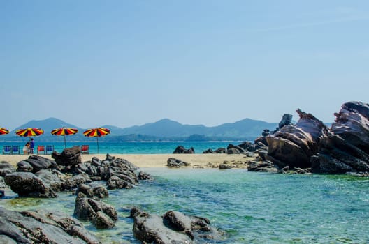 Rocks and stone beach Similan Islands with famous Sail Rock, Phang Nga Thailand nature landscape.