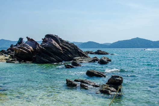 Rocks and stone beach Similan Islands with famous Sail Rock, Phang Nga Thailand nature landscape.