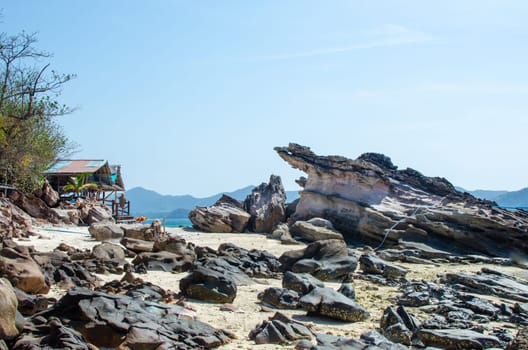 Rocks and stone beach Similan Islands with famous Sail Rock, Phang Nga Thailand nature landscape.