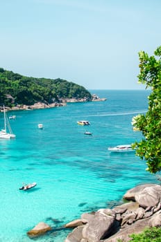 Tropical islands of ocean blue sea water and white sand beach at Similan Islands with famous Sail Rock, Phang Nga Thailand nature landscape. High quality photo