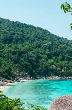 Tropical islands of ocean blue sea water and white sand beach at Similan Islands with famous Sail Rock, Phang Nga Thailand nature landscape. High quality photo