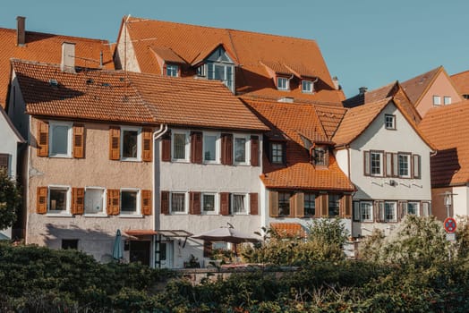 Old national German town house. Old Town is full of colorful and well preserved buildings. Baden-Wurttemberg is a state in southwest Germany bordering France and Switzerland. The Black Forest, known for its evergreen scenery and traditional villages, lies in the mountainous southwest. Stuttgart, the capital, is home to Wilhelma, a royal estate turned zoo and gardens. Porsche and Mercedes-Benz have headquarters and museums there. The 19th-century Hohenzollern Castle sits in the Swabian Alps to the south.