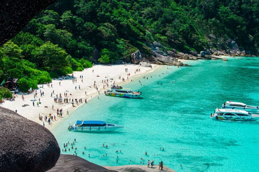 Tropical islands of ocean blue sea water and white sand beach at Similan Islands with famous Sail Rock, Phang Nga Thailand nature landscape. High quality photo