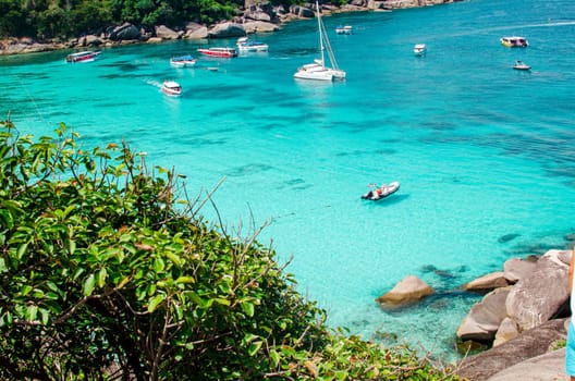 Tropical islands of ocean blue sea water and white sand beach at Similan Islands with famous Sail Rock, Phang Nga Thailand nature landscape. High quality photo