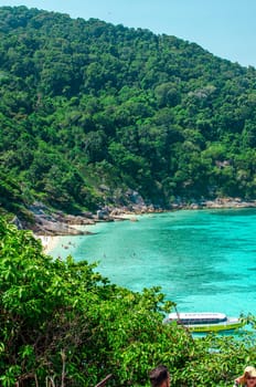 Tropical islands of ocean blue sea water and white sand beach at Similan Islands with famous Sail Rock, Phang Nga Thailand nature landscape. High quality photo