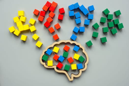 Brain and flows of colored cubes as concept for learning and neurodiversity.